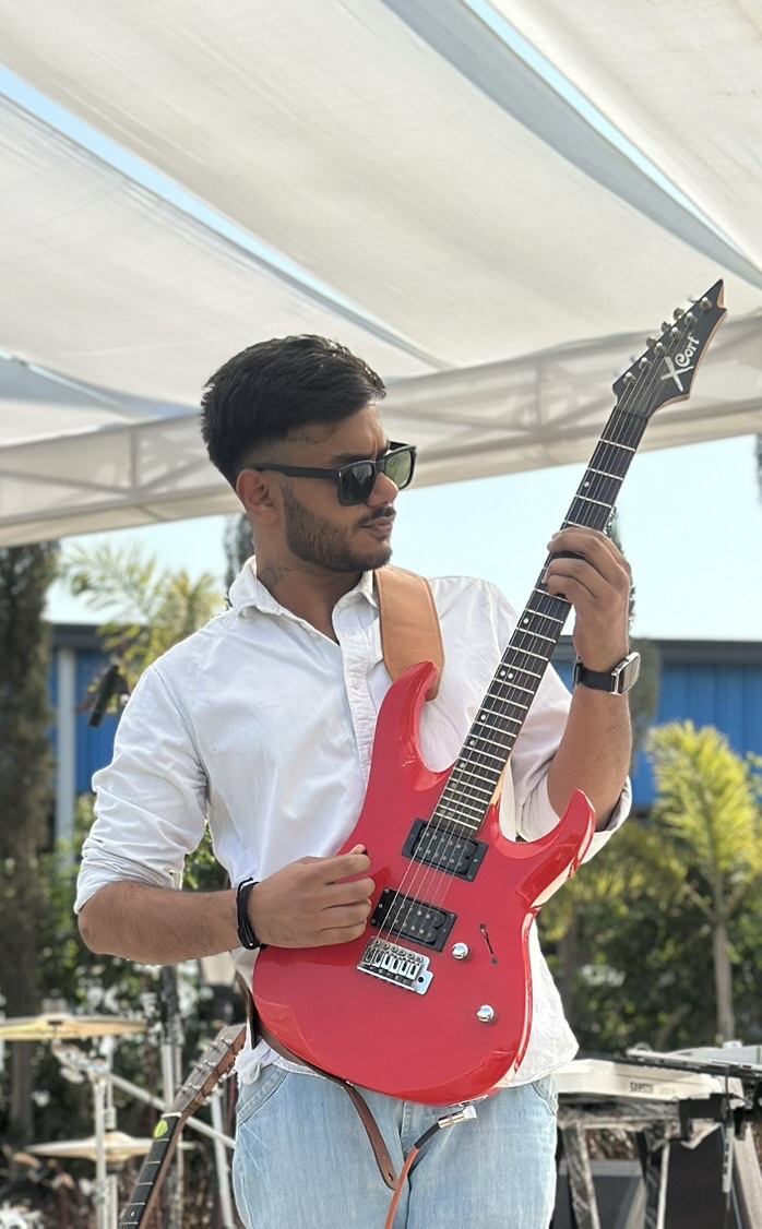 Jam And Play founder Arya Sen performing outdoors