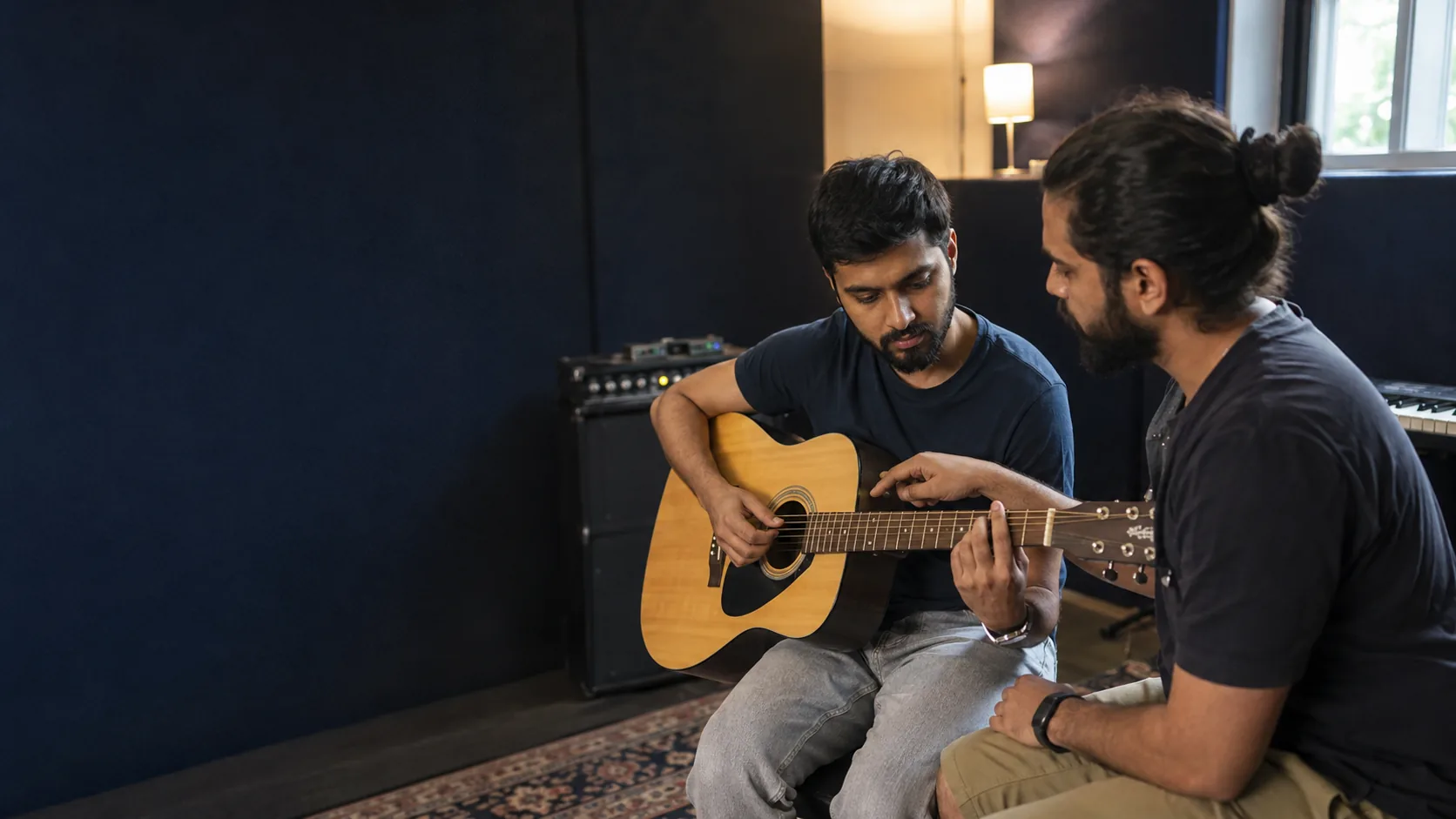 Jam And Play student learning music with an instructor